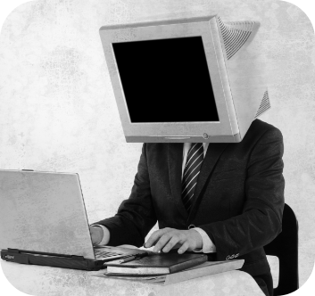 Man with a computer for a head looking at a laptop